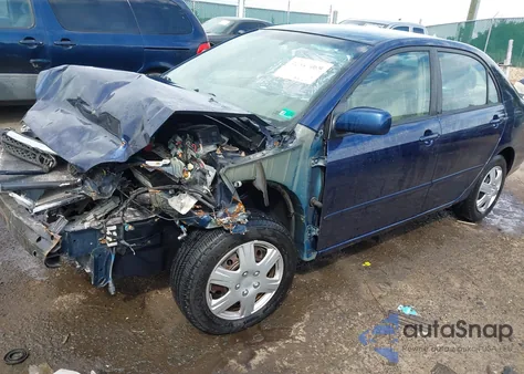 2005 Toyota Corolla Le z USA, uszkodzony, nr VIN 2T1BR32E75C422935